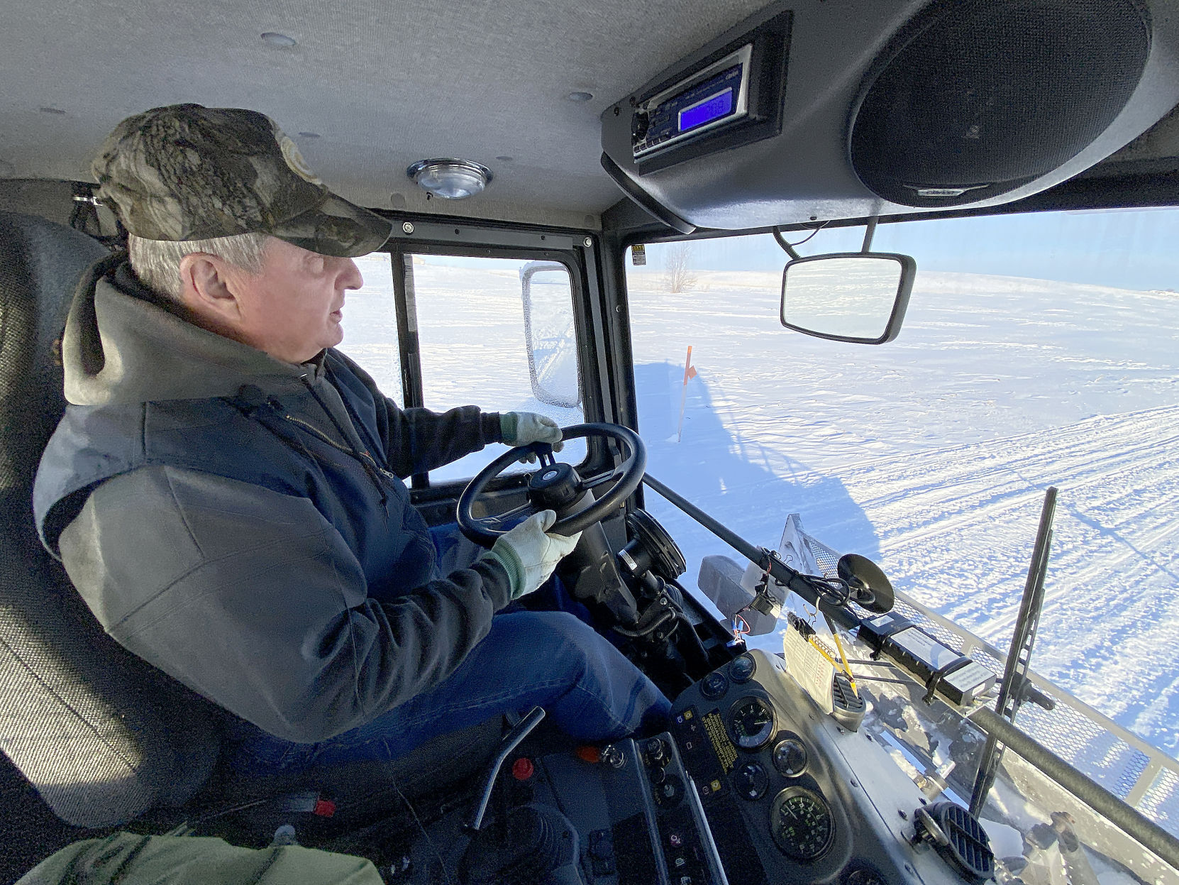 Grooming the snowmobile trail